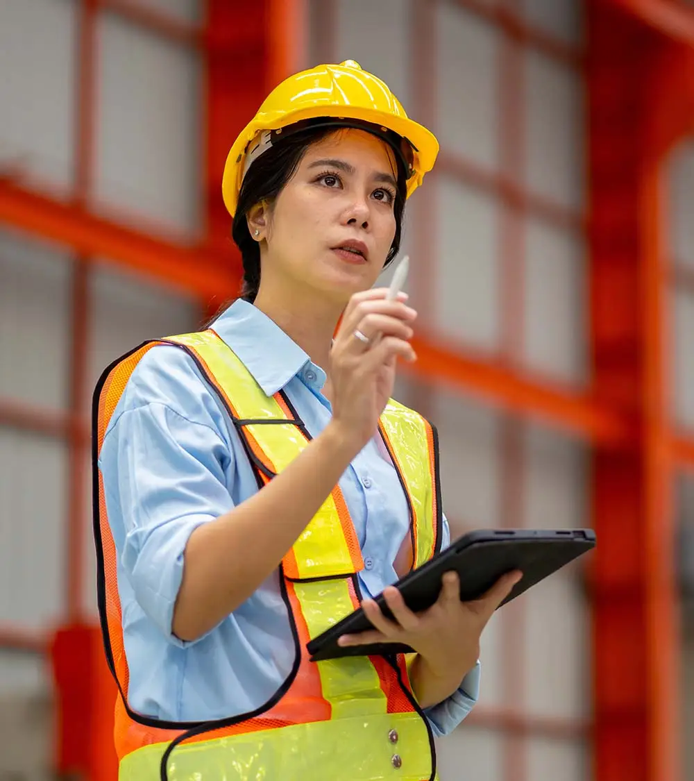 woman holding a tablet and pen