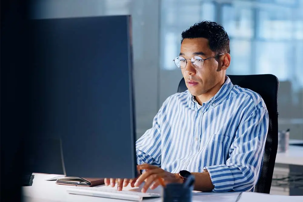 man working on computer