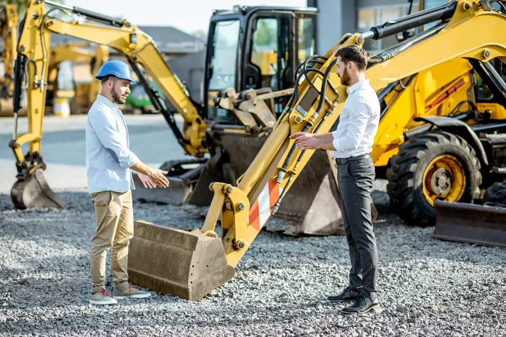 construction builder talking with consultant